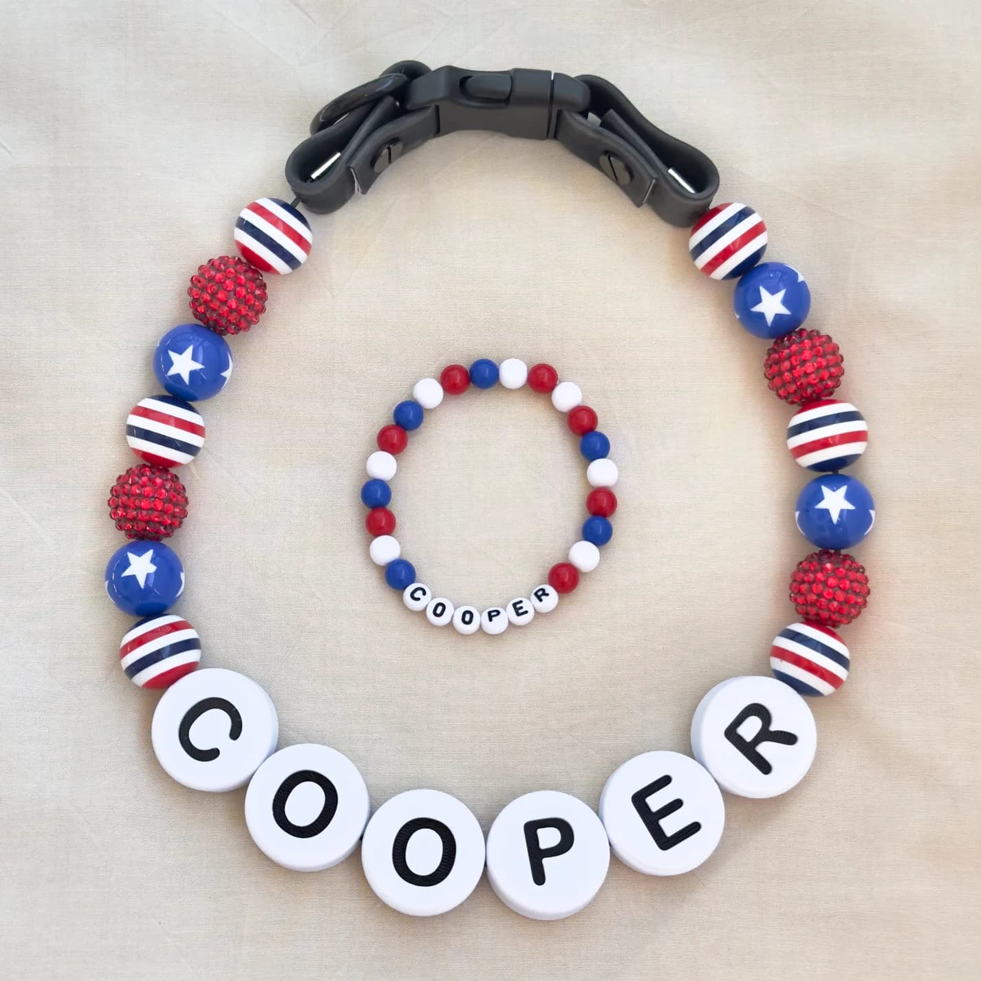 A beaded name collar with its matching bracelet